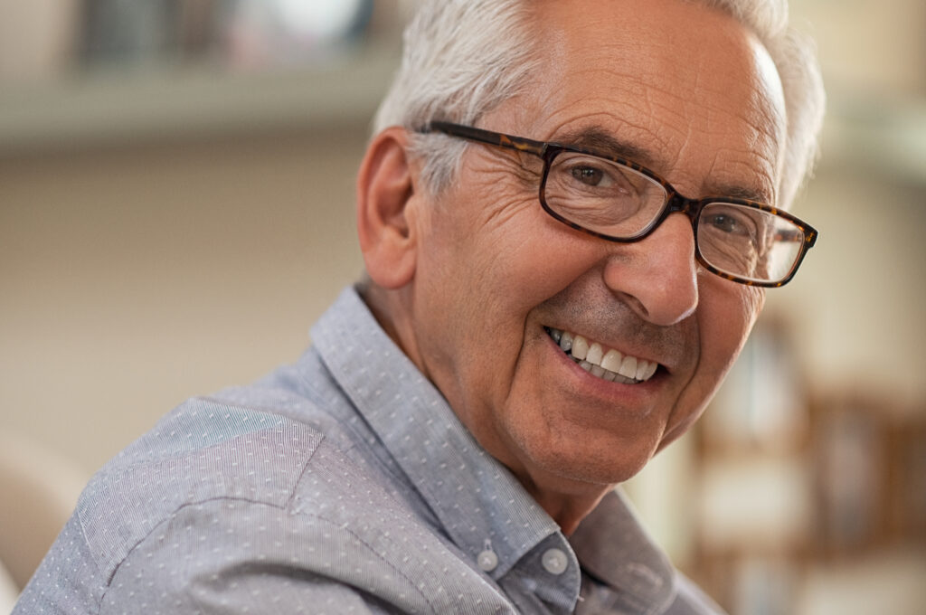 Smiling senior man in glasses