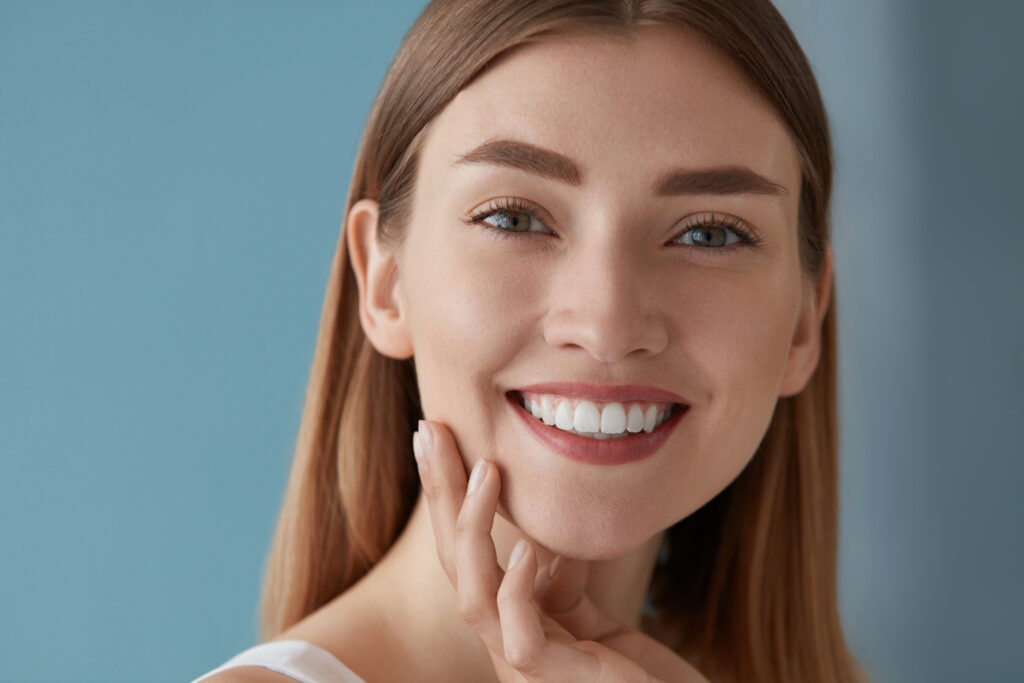 Smiling woman with white teeth smile