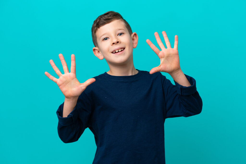 Small boy on blue background